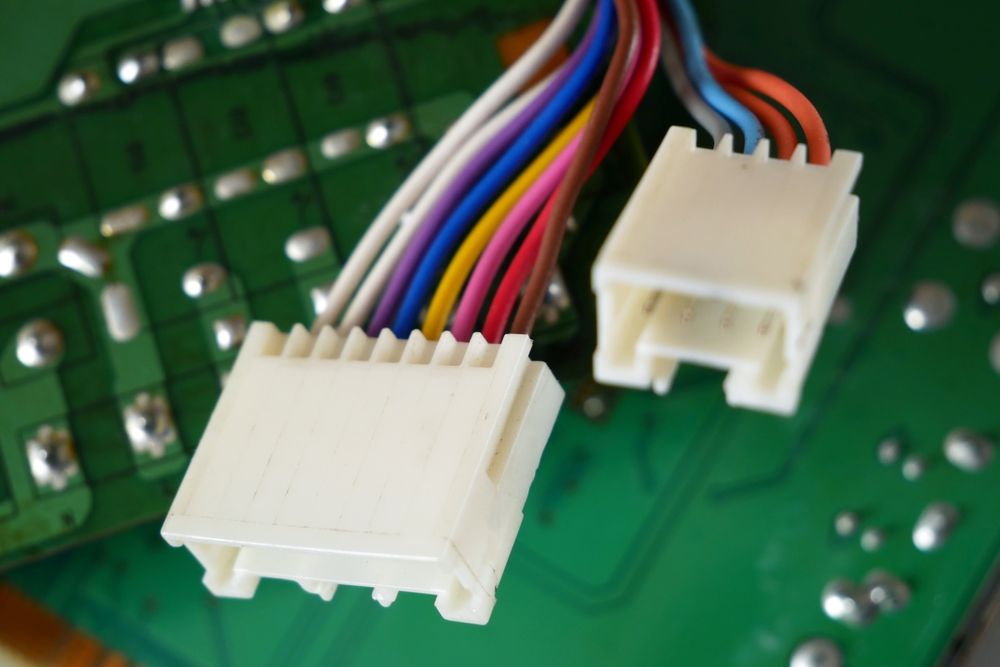 Computer chip, motherboard, futuristic circuit board with electrons, macro, closeup