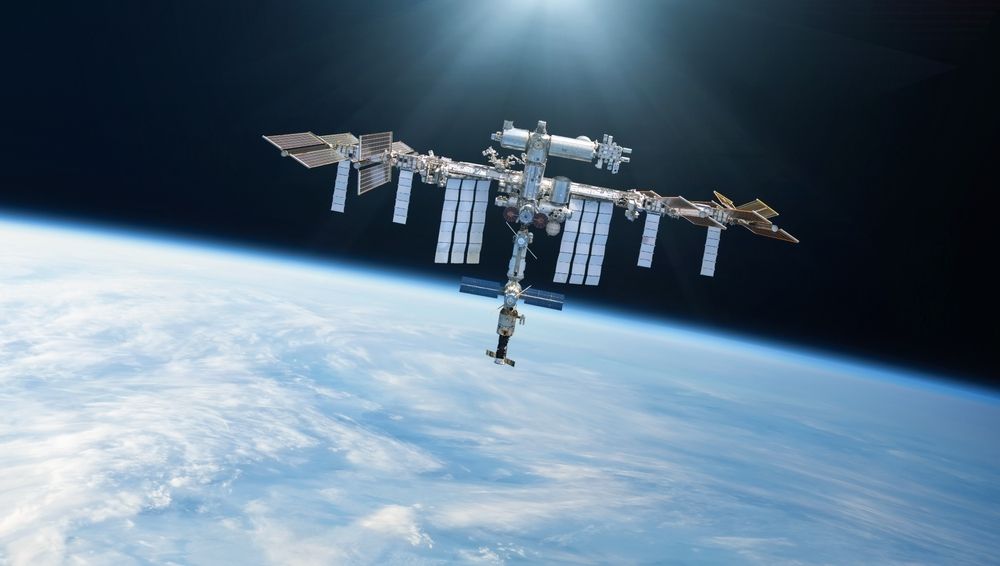 International Space Station orbiting above Earth. Outer space laboratory. Elements of this image furnished by NASA.