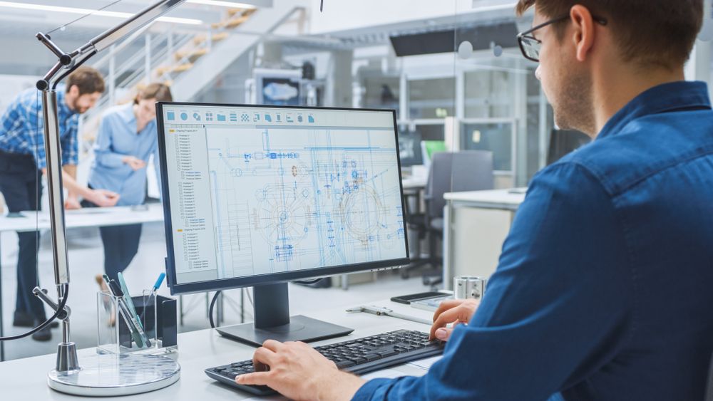 Mechanical design engineer at the desk