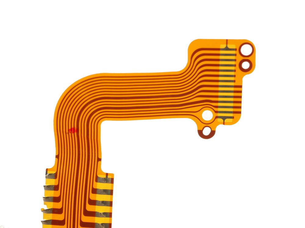 detail of flexed printed circuit on white background