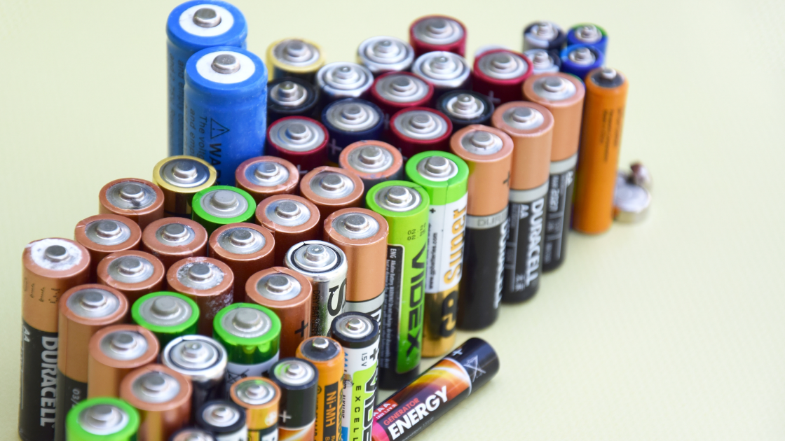 Wide view of mixed alkaline and rechargeable battery collection in multiple sizes