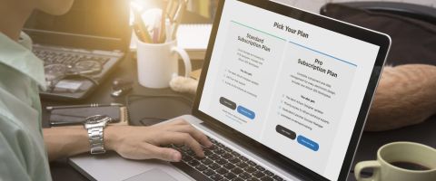 Person typing on laptop