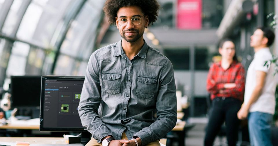 A PCB layout displayed in Altium, showing multiple green circuit boards with various components and connections.